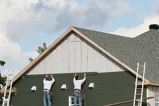 Professional Siding Contractor technician working in Mattapan, MA